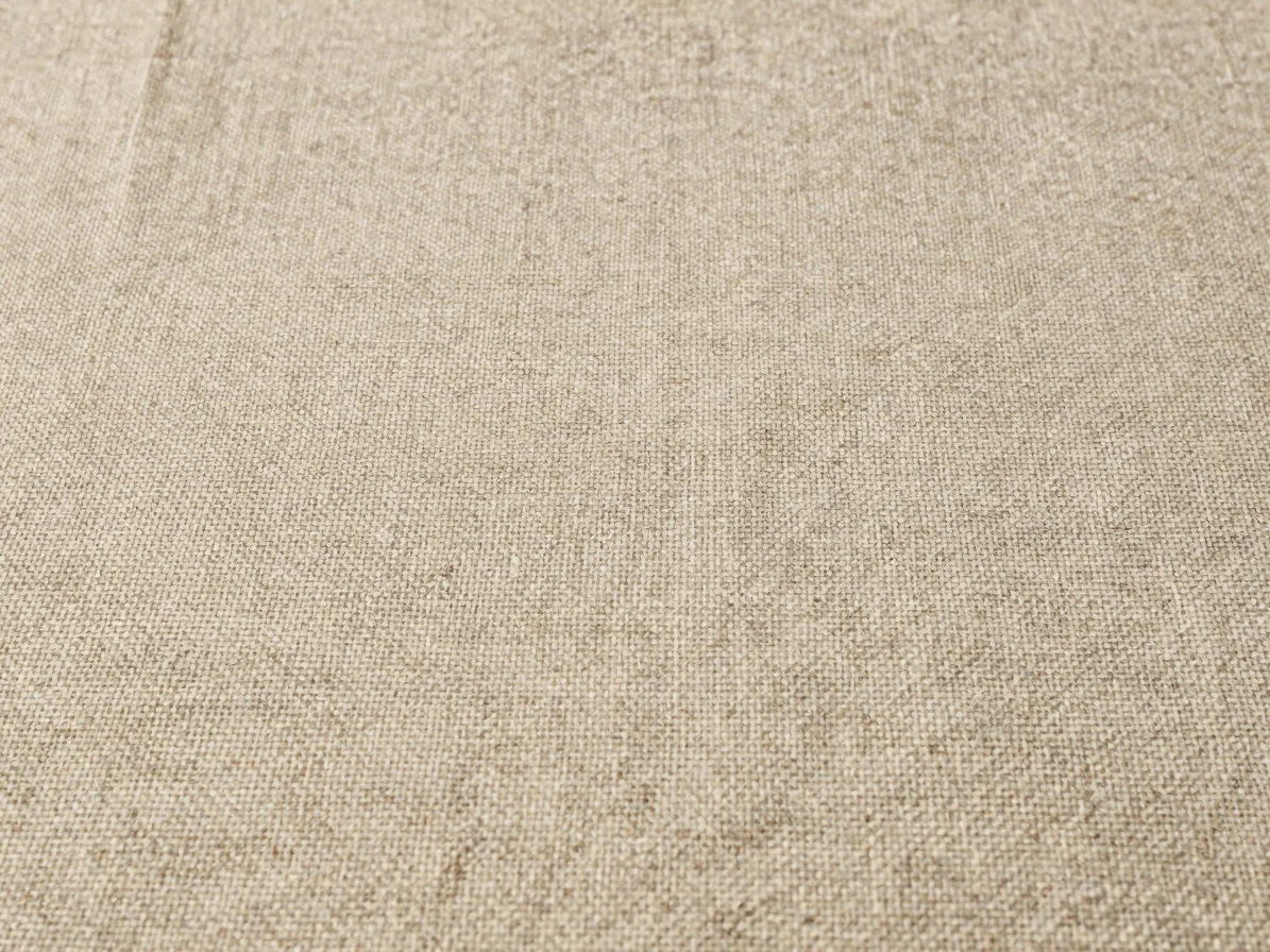 Close detail of a silk and natural fiber blend fabric surface, visible mixed threads, soft directional daylight, restrai
